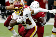 Washington Football Team running back Antonio Gibson (24) looks to run against the Arizona Cardinals during the first half of an NFL football game, Sunday, Sept. 20, 2020, in Glendale, Ariz. (AP Photo/Darryl Webb)