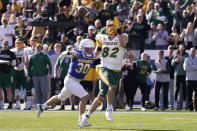 CORRECTS TO NORTH DAKOTA STATE NOT NORTH DAKOTA - North Dakota State tight end Joe Stoffel (82) catches a touchdown pass in front of South Dakota State linebacker Payton Shafer (30) during the first half of the FCS Championship NCAA college football game Sunday, Jan. 8, 2023, in Frisco, Texas. (AP Photo/LM Otero)