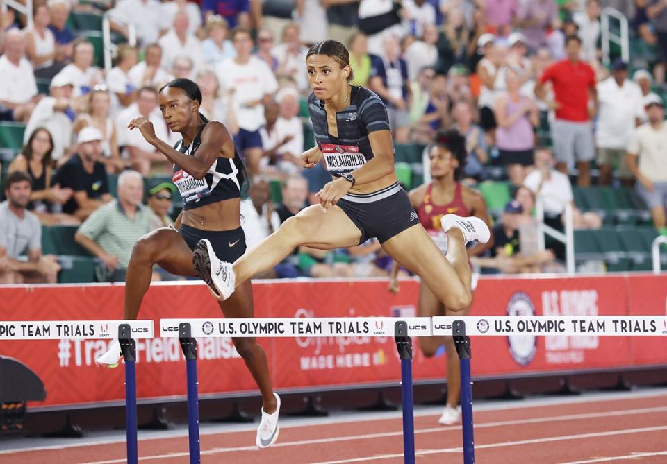 Sydney McLaughlin waves from the podium after winning the Women's 400 Meters Hurdles Final during day ten of the 2020 U.S. Olympic Track &amp; Field Team Trials at Hayward Field on June 27, 2021