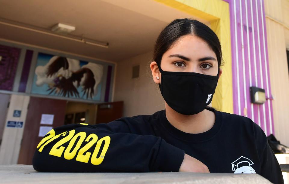 Bell High School senior Kenia Molina in front of campus in Bell, California on April 15, 2020. (Photo: FREDERIC J. BROWN/AFP via Getty Images)