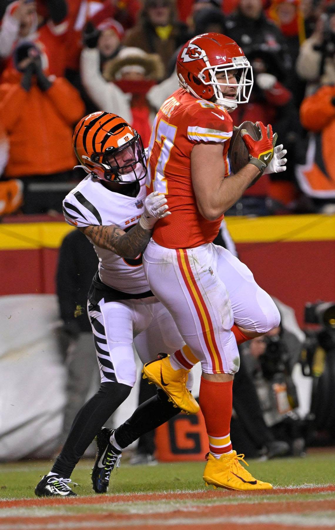 Chiefs tight end Travis Kelce (87) gets in for a touchdown during the first half against the Cincinnati Bengals in the AFC Championship Game on Sunday, Jan. 29, 2023, at GEHA Field at Arrowhead Stadium.