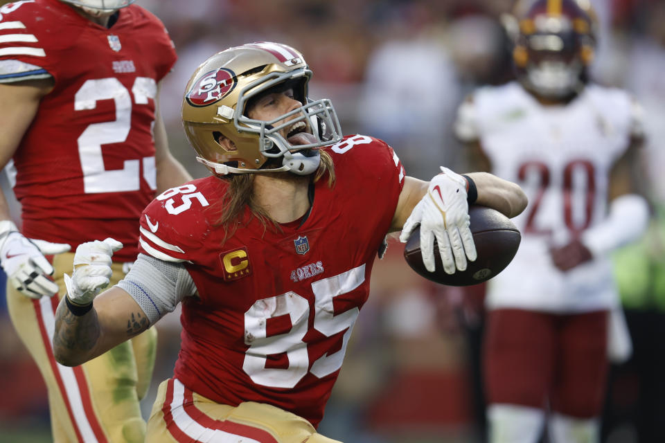 San Francisco 49ers tight end George Kittle reacts after making a catch in the second half of an NFL football game against the Washington Commanders, Saturday, Dec. 24, 2022, in Santa Clara, Calif. (AP Photo/Jed Jacobsohn)