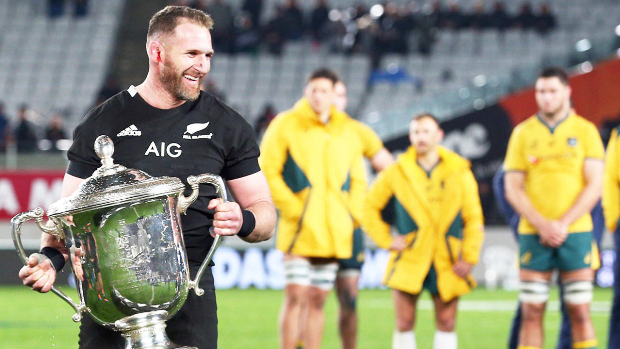 All Blacks captain Kieran Read lifts the Bledisloe Trophy.