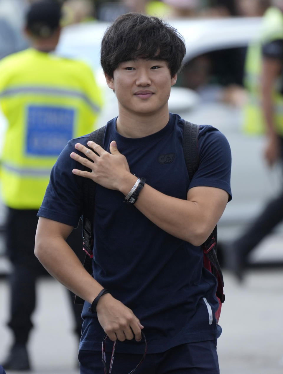 AlphaTauri driver Yuki Tsunoda of Japan arrives at the Monza racetrack, in Monza, Italy, Thursday, Sept. 8, 2022. The Formula one race will be held on Sunday. (AP Photo/Luca Bruno)