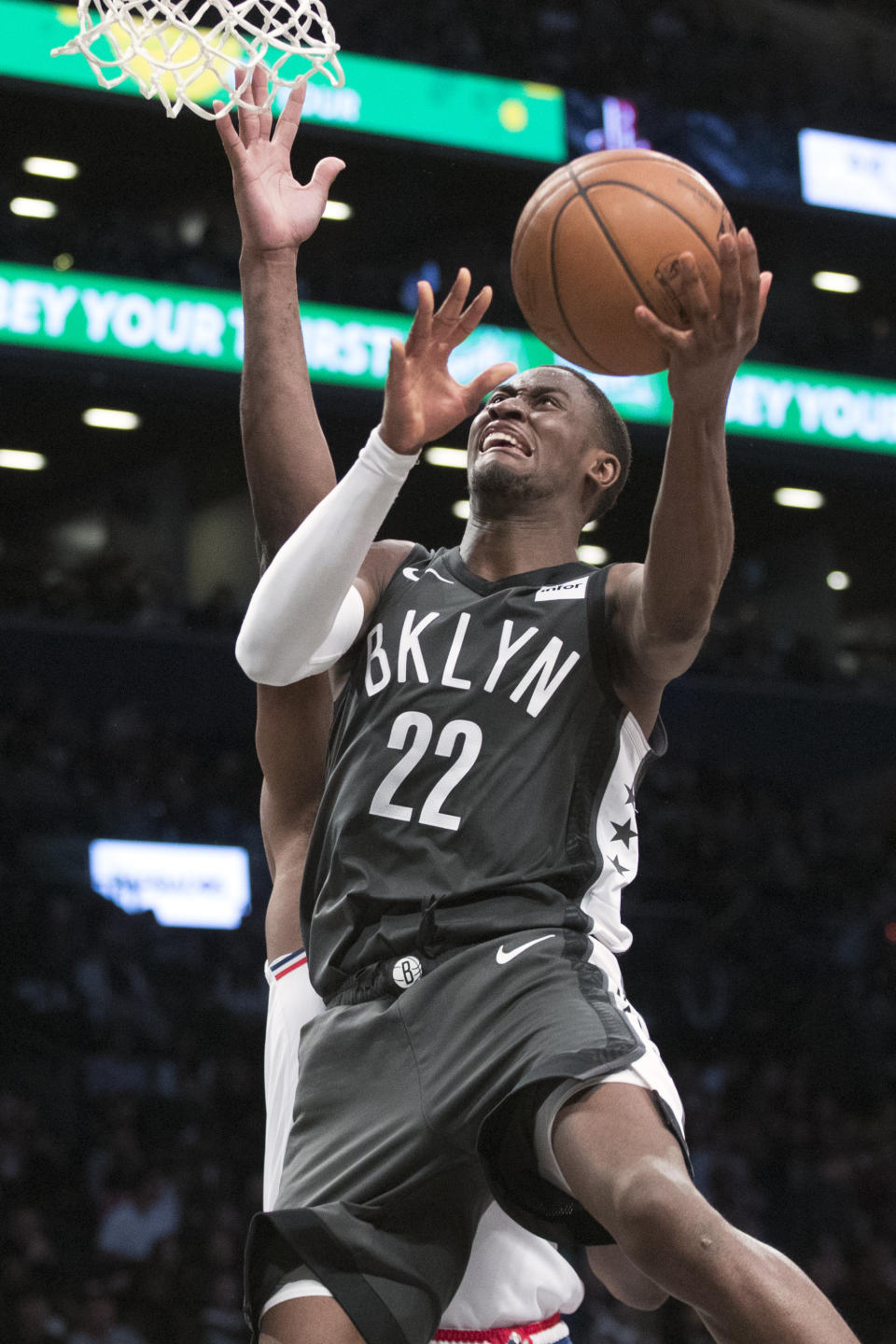 Brooklyn Nets guard Caris LeVert (22) goes to the basket during the second half of Game 4 of a first-round NBA basketball playoff series against the Philadelphia 76ers, Saturday, April 20, 2019, in New York. (AP Photo/Mary Altaffer)