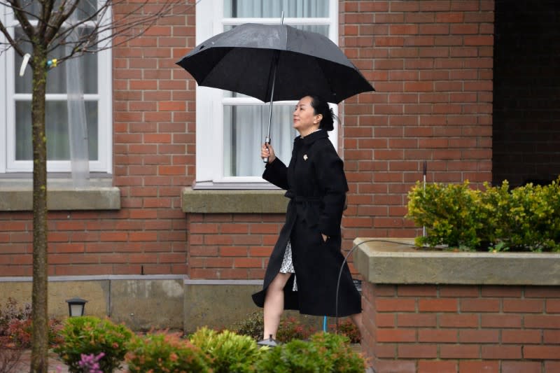 Huawei Chief Financial Officer Meng Wanzhou leaves her home to attend her extradition hearing in Vancouver