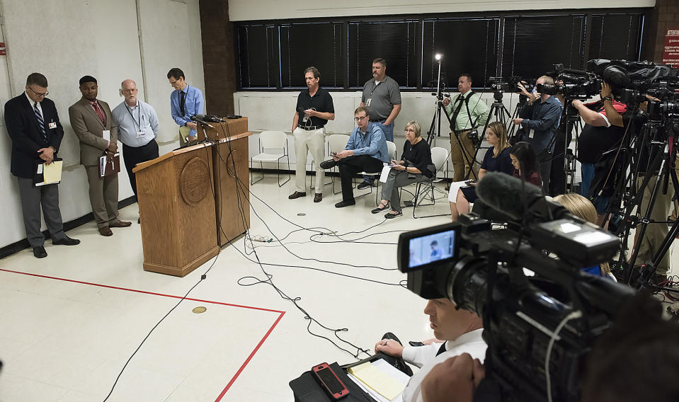 From left, media witnesses Joe Duggan of the Omaha World-Herald, Chip Matthews of News Channel Nebraska, Brent Martin of Nebraska Radio Network and Grant Schulte of The Associated Press answer questions after the execution of Carey Dean Moore on Tuesday, Aug. 14, 2018. at the Nebraska State Penitentiary. Nebraska carried out its first execution in more than two decades on Tuesday with a drug combination never tried before, including the first use of the powerful opioid fentanyl in a lethal injection. Moore had been sentenced to death for killing two cab drivers in Omaha in 1979. (Gwyneth Roberts /Lincoln Journal Star via AP)