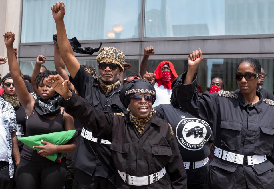 The Dayton chapter of the Black Panthers protest against a small group from a KKK-affiliated group during a rally in Dayton, Ohio, May 25, 2019. | SETH HERALD—AFP/Getty Images