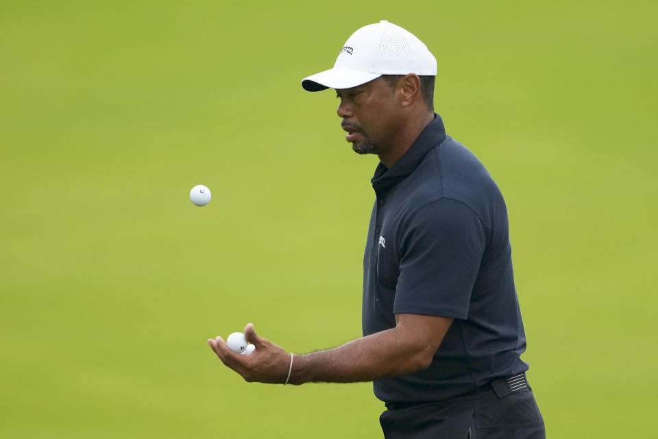 Tiger Woods catches a ball on the seventh hole during a practice round for the PGA Championship golf tournament at the Valhalla Golf Club, Wednesday, May 15, 2024, in Louisville, Ky. (AP Photo/Matt York)