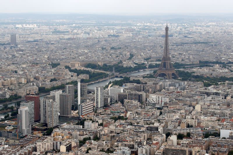 An aerial view shows the Eiffel tower, the Seine River and the Paris skyline