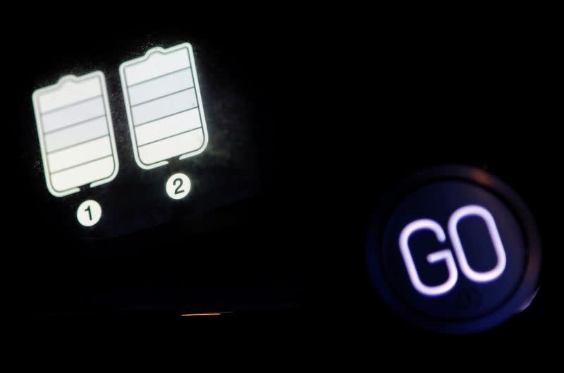 An instrument panel shows batteries residual quantity in a Gogoro's electric scooter in Taipei