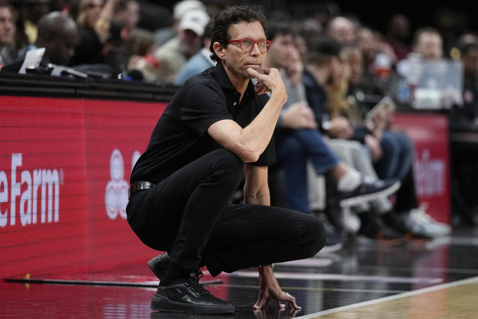 Atlanta Hawks head coach Quin Synder watches from the sideline during the first half of an NBA basketball game against the Atlanta Hawks Monday, Dec. 18, 2023, in Atlanta. (AP Photo/John Bazemore)