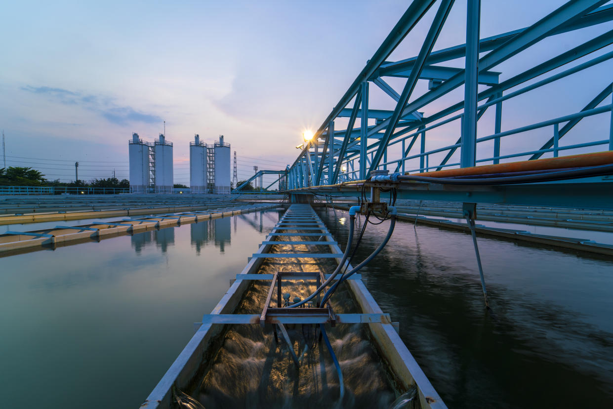 water treatment plant with sunset