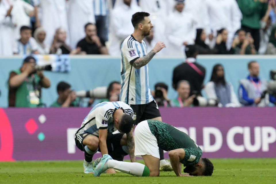 Argentina's Lionel Messi leaves the pitch after losing the World Cup group C soccer match between Argentina and Saudi Arabia at the Lusail Stadium in Lusail, Qatar, Tuesday, Nov. 22, 2022. (AP Photo/Natacha Pisarenko)