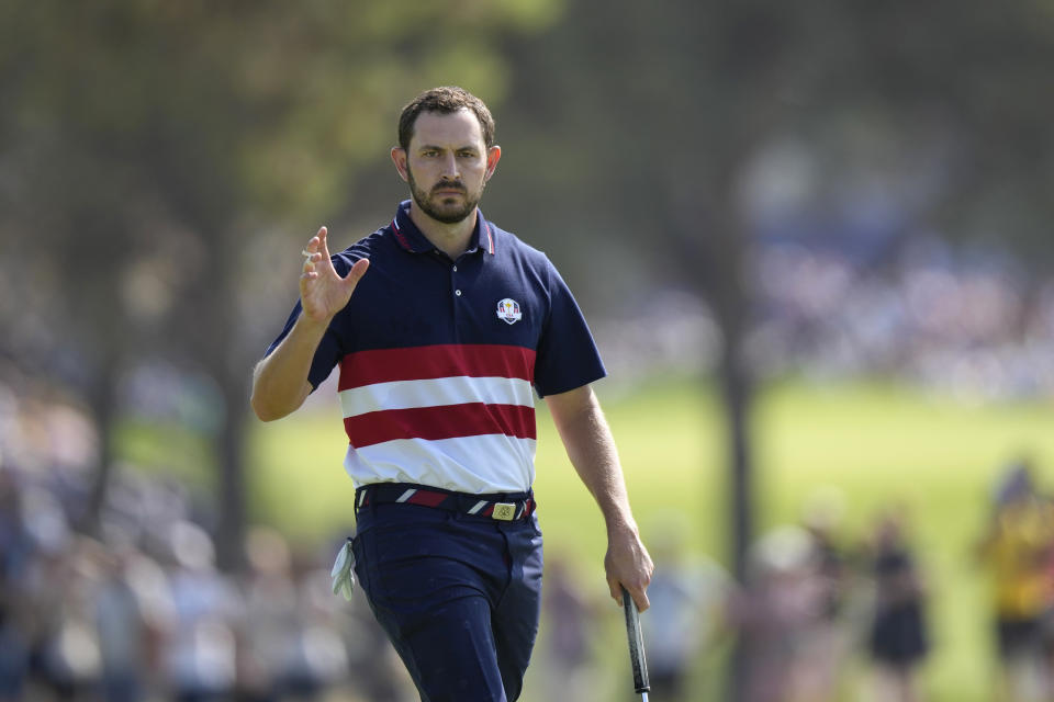 FILE- United States' Patrick Cantlay reacts to the crowd on the 1st green during their singles match at the Ryder Cup golf tournament at the Marco Simone Golf Club in Guidonia Montecelio, Italy, Sunday, Oct. 1, 2023. A Sports Illustrated report says Cantlay has seized control in PGA Tour board negotiations with LIV Golf backers. Jordan Spieth refuted the report. (AP Photo/Andrew Medichini, FIle)