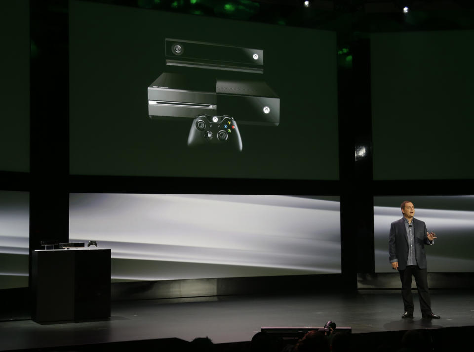 Marc Whitten, Microsoft Corp.'s chief production officer of interactive entertainment, talks about the features of the next-generation Xbox One entertainment and gaming console system, Tuesday, May 21, 2013, at an event in Redmond, Wash. (AP Photo/Ted S. Warren)