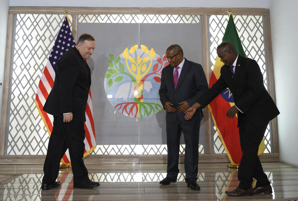 US Secretary of State Mike Pompeo, left, meets with Ethiopian Minister of Foreign Affairs Gedu Andargachew at the Foreign Ministry in Addis Ababa, Tuesday Feb. 18, 2020. Pompeo's visit to Africa is the first by a Cabinet official in 18 months. (Andrew Caballero-Reynolds/Pool via AP)