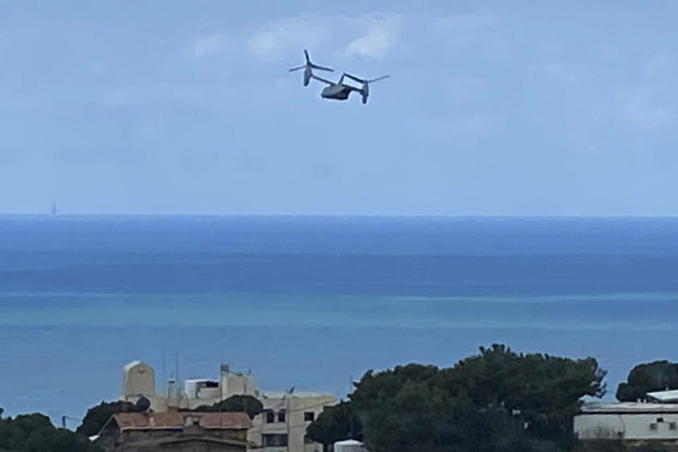 A U.S. Marine Osprey is seen taking off from the U.S. Embassy in Aukar, northeast of Beirut, Lebanon, Thursday, March 19, 2020. The aircraft took off a few hours before a U.S. senator announced that Lebanese-American Amer Fakhoury, who had faced decades-old murder and torture charges in Lebanon, was freed from a prison in Lebanon. Lebanese officials alleged that Fakhoury, 57, of Dover, New Hampshire, who had been jailed since September, was responsible for the killings and abuse of prisoners in Lebanon as part of an Israeli-backed militia two decades ago. (AP Photo/Zeina Karam)