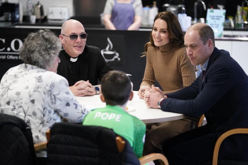 The Duke and Duchess of Cambridge meeting Pastor Mick Fleming during a visit to the Church on the Street in Burnley (PA)