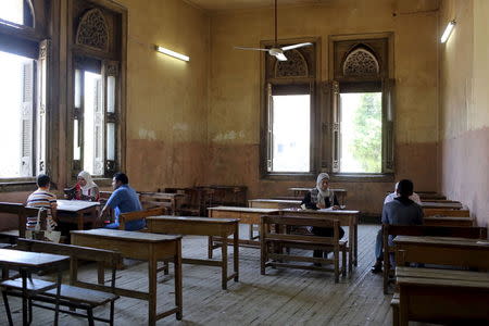 Students are seen during a Koran verbal recital exam in one of the Al-Azhar institutes in Cairo, Egypt, May 20, 2015. REUTERS/Asmaa Waguih