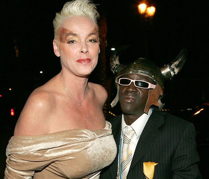 Their love unfolded after meeting in 2004 on VH1's The Surreal Life. Their connection was so strong that the two ended up getting a spin-off show called Strange Love in 2005. But Brigitte and the Public Enemy co-founder called it quits by the end of the show due to their constant disagreements.