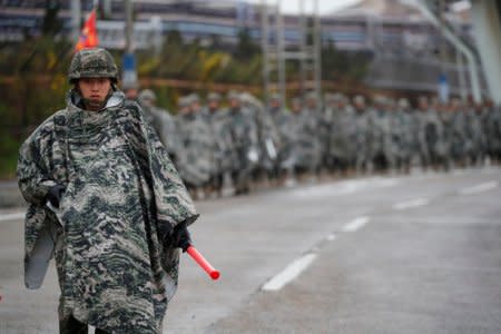 South Korean marines march during a military exercise as a part of the annual joint military training called Foal Eagle between South Korea and the U.S. in Pohang, South Korea, April 5, 2018.  REUTERS/Kim Hong-Ji/File Photo