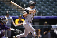 Pittsburgh Pirates' Adam Frazier triples off Colorado Rockies starting pitcher Jon Gray in the first inning of a baseball game Wednesday, June 30, 2021, in Denver. (AP Photo/David Zalubowski)