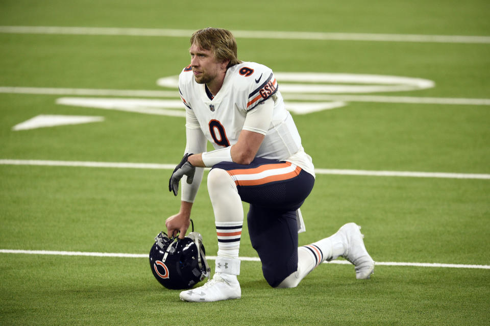 Chicago Bears quarterback Nick Foles (9) kneels on the field in the closing minutes of a loss to the Los Angeles Rams in an NFL football game Monday, Oct. 26, 2020, in Inglewood, Calif. (AP Photo/Kelvin Kuo)