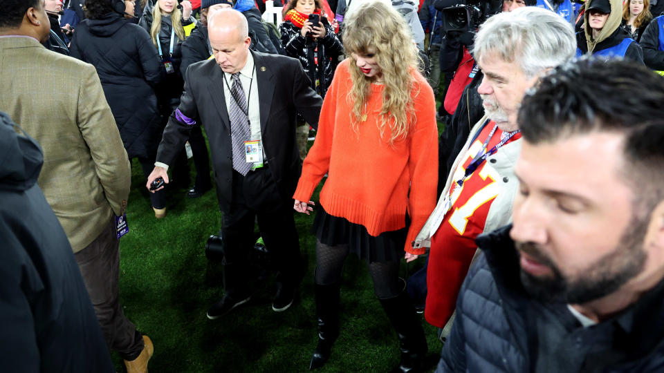 Taylor Swift walks off the field after the Kansas City Chiefs 17-10 victory against the Baltimore Ravens in the AFC Championship Game at M&T Bank Stadium on January 28, 2024 in Baltimore, Maryland.