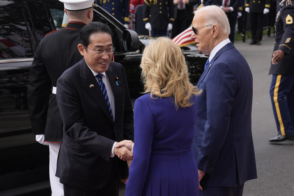 President Joe Biden and first lady Jill Biden welcome Japanese Prime Minister Fumio Kishida during a State Arrival Ceremony on the South Lawn of the White House, Wednesday, April 10, 2024, in Washington. (AP Photo/Evan Vucci)