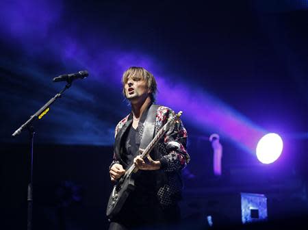 Lead vocalist Matthew Bellamy of Muse performs at the Coachella Valley Music and Arts Festival in Indio, California April 12, 2014. REUTERS/Mario Anzuoni