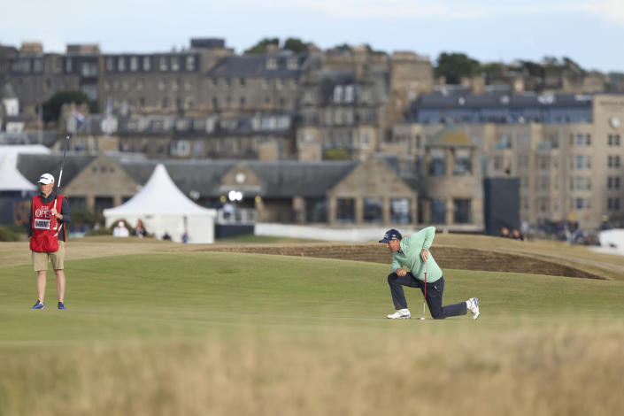 Ireland's Padraig Harrington lines up a putt on the 15th green during the first round of the British Open golf championship on the Old Course at St. Andrews, Scotland, Thursday, July 14, 2022. The Open Championship returns to the home of golf on July 14-17, 2022, to celebrate the 150th edition of the sport's oldest championship, which dates to 1860 and was first played at St. Andrews in 1873. (AP Photo/Peter Morrison)