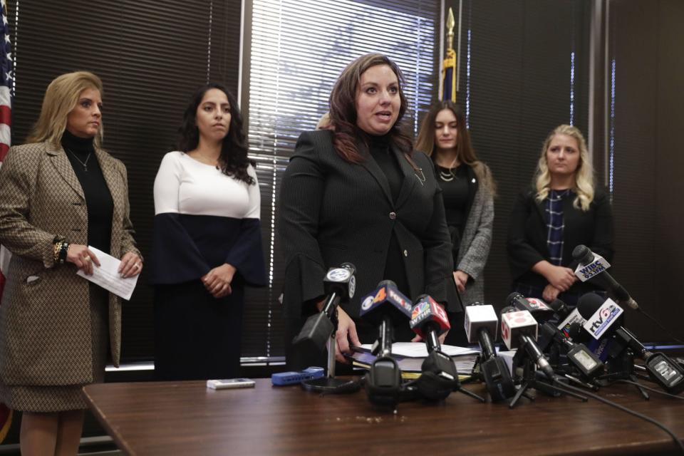 Attorney Hannah Kaufman Joseph announces the filing of a civil lawsuit against Indiana Attorney General Curtis Hill during a press conference in Indianapolis, Tuesday. She, is joined by by the accusers, from left, State Rep. Mara Candelaria Reardon, Samantha Lozano, Niki DaSilva and Gabrielle McLemore.