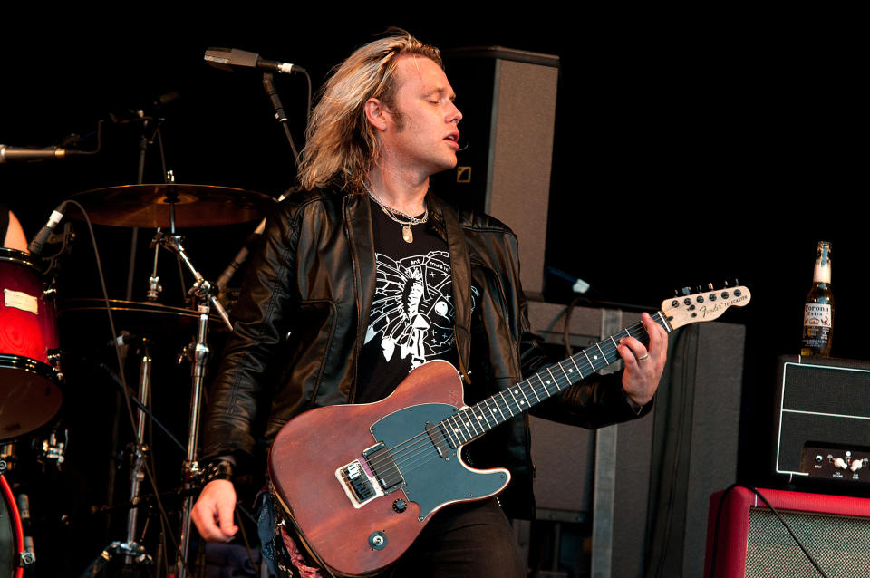 <p>Tom Edwards was the guitarist and music director for Adam Ant. He died Jan. 25 of suspected heart failure. He was 41.<br> (Photo: Ollie Millington/Redferns via Getty Images) </p>