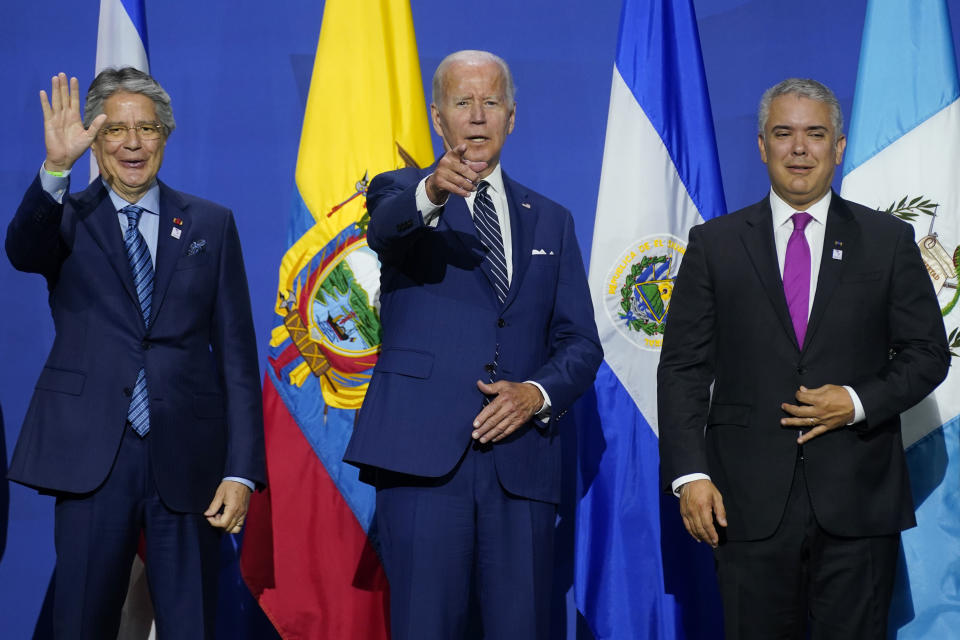 From left, Ecuador President Guillermo Lasso, President Joe Biden and Colombian President Ivan Duque motion during a meeting on migration at the Summit of the Americas, Friday, June 10, 2022, in Los Angeles. (AP Photo/Evan Vucci)