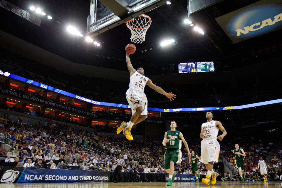 LOUISVILLE, KY - MARCH 15: Isaiah Canaan #3 of the Murray State Racers goes up for the dunk against Wes Eikmeier #10 of the Colorado State Rams during the second round of the 2012 NCAA Men's Basketball Tournament at KFC YUM! Center on March 15, 2012 in Louisville, Kentucky. (Photo by Andy Lyons/Getty Images)