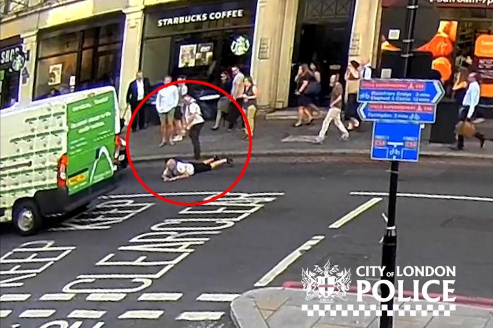 The man was shoved into the path of oncoming vehicles after the pair 'brushed shoulders'