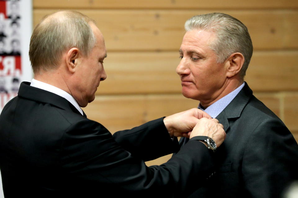 ST PETERSBURG, RUSSIA - NOVEMBER 27, 2019: Russia's President Vladimir Putin (L) and Boris Rotenberg, co-owner and a member of the Board of Directors at SMP Bank, awarded the Alexander Nevsky order, during a ceremony to present state awards at the Turbostroitel judo club. Mikhail Tereshchenko/TASS (Photo by Mikhail Tereshchenko\TASS via Getty Images)