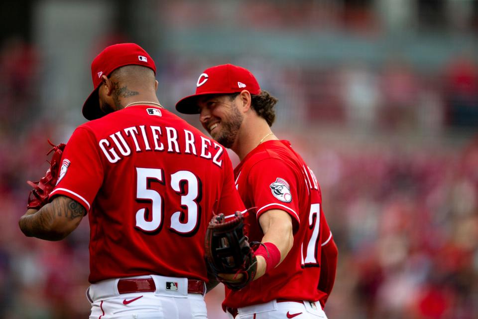 Cincinnati Reds shortstop Kyle Farmer (17) celebrates with Cincinnati Reds starting pitcher Vladimir Gutierrez (53) at the end of the fifth inning of the MLB game between the Cincinnati Reds and the San Francisco Giants at Great American Ball Park in Cincinnati, Saturday, May 28, 2022.
