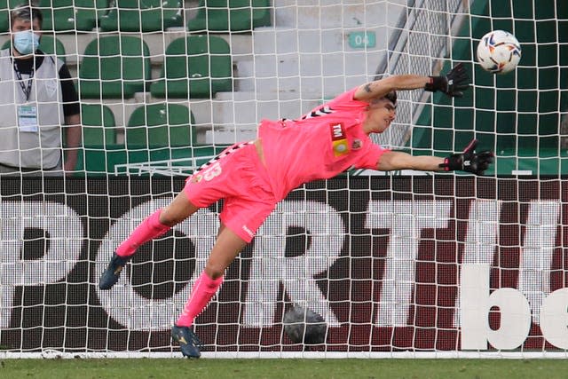 Elche keeper Edgar Badia  had worked hard to keep Barcelona at bay before being beaten a second time