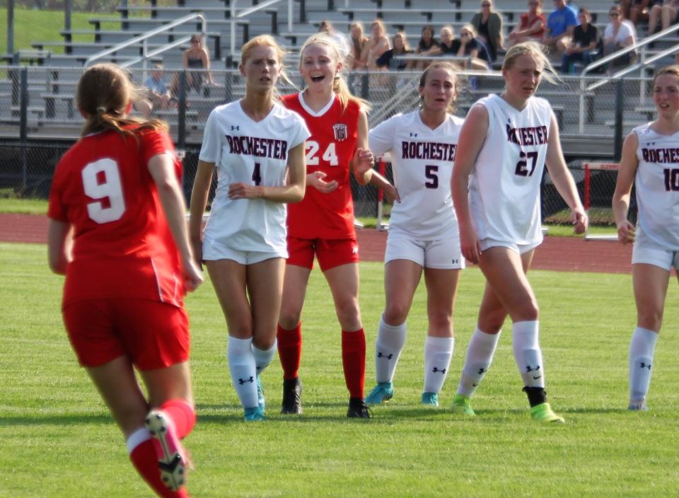Chatham Glenwood senior forward Ainslie Wilson (24) reacts after Ella Gorrie (9) converted a penalty kick during the first half against Rochester at the Glenwood Athletic Complex on Tuesday, May 10. Glenwood won 8-0.