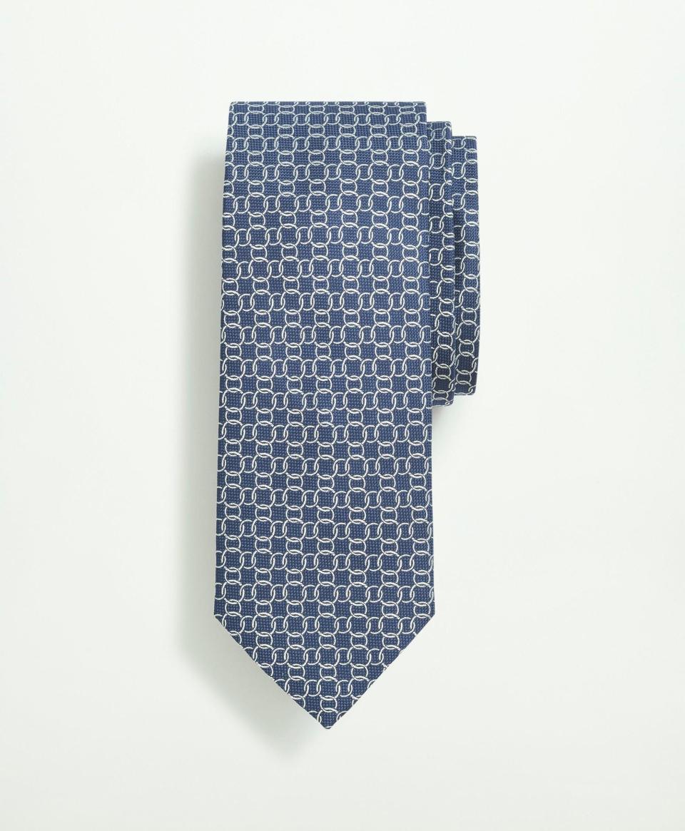 <p><a href="https://go.redirectingat.com?id=74968X1596630&url=https%3A%2F%2Fwww.brooksbrothers.com%2Fsilk-circle-link-pattern-tie%2FMA03262.html%3Fdwvar_MA03262_Color%3DNAVY&sref=https%3A%2F%2F" rel="nofollow noopener" target="_blank" data-ylk="slk:Shop Now;elm:context_link;itc:0;sec:content-canvas" class="link ">Shop Now</a></p><p>Silk Circle Link Pattern Tie</p><p>Brooks Brothers</p><p>$108.00</p>