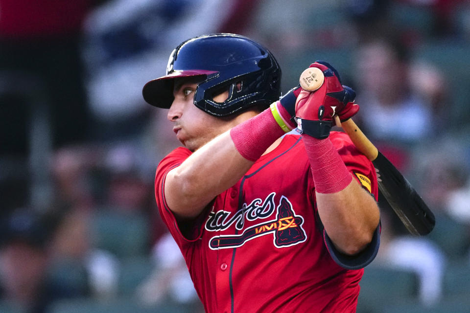 Atlanta Braves' Austin Riley hits a single in the fourth inning of a baseball game against the Tampa Bay Rays Friday, June 14, 2024, in Atlanta. (AP Photo/John Bazemore)