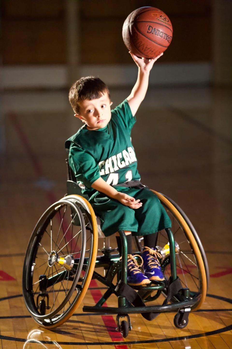 Alec Cabacungan, a national television spokesperson for Shriners Hospitals for Children, is shown as a young boy playing basketball in Chicago. Cabacungan was an Indiana Pacers intern this summer.