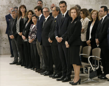 Spain's Prime Minister Pedro Sanchez stands next to former Queen Sofia and Catalan President Quim Torra during the funeral of Spanish opera singer Montserrat Caballe in Barcelona, Spain, October 8, 2018. Andreu Dalmau/Pool via Reuters