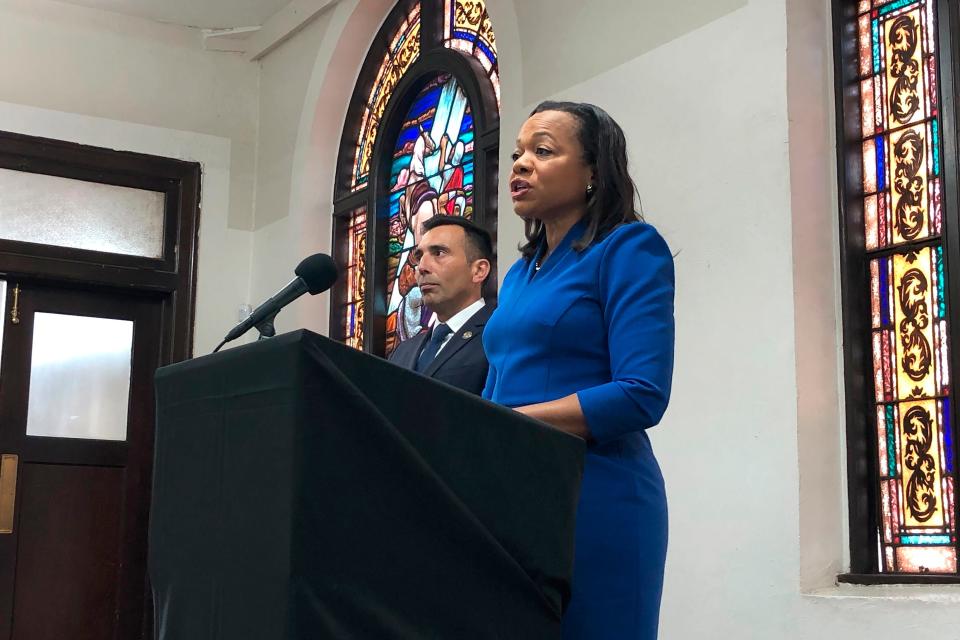 Assistant Attorney General of the U.S. Department of Justice's Civil Rights Division Kristen Clarke, right, speaks next to United States Attorney Martin Estrada, of the California central division, while announcing the largest redlining case in American history during a news conference Thursday, Jan. 12, 2023, at the Second Baptist Church in Los Angeles.