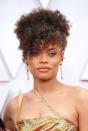 <p>Andra Day matched her molten-gold Vera Wang gown with a similarly bronzed beauty look and a soft, curly updo.</p>