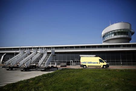 A service van is seen in front of the airport in Lodz October 10, 2014. REUTERS/Kacper Pempel