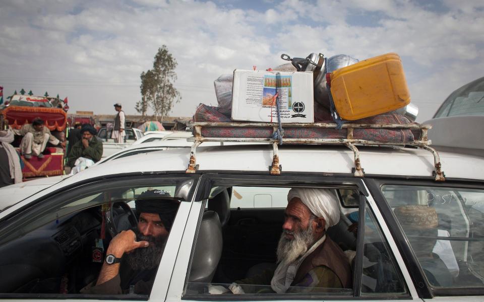 File picture of Helmandi farmers taking a taxi from Laskhkar Gah bus station in Afghanistan's Helmand province - Majid Saeedi for the Telegraph