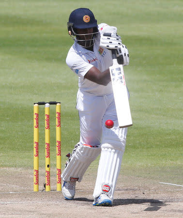 Cricket - South Africa v Sri Lanka - Second Test cricket match - Newlands Stadium, Cape Town, South Africa - 5/1/17. Sri Lanka's Angelo Mathews plays a shot . REUTERS/Mike Hutchings